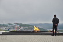 man standing in front of flame